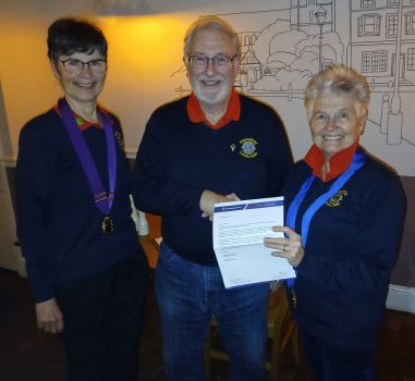 Steve of Petersfield Lions receiving his 30 year chevron